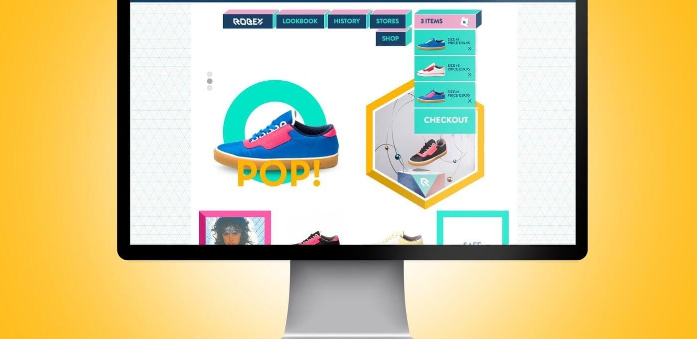 Monitor on a yellow gradient background showing a colorful sneaker storefront with a blue-pink shoe, POP! graphic, and a turquoise hexagonal promo frame.