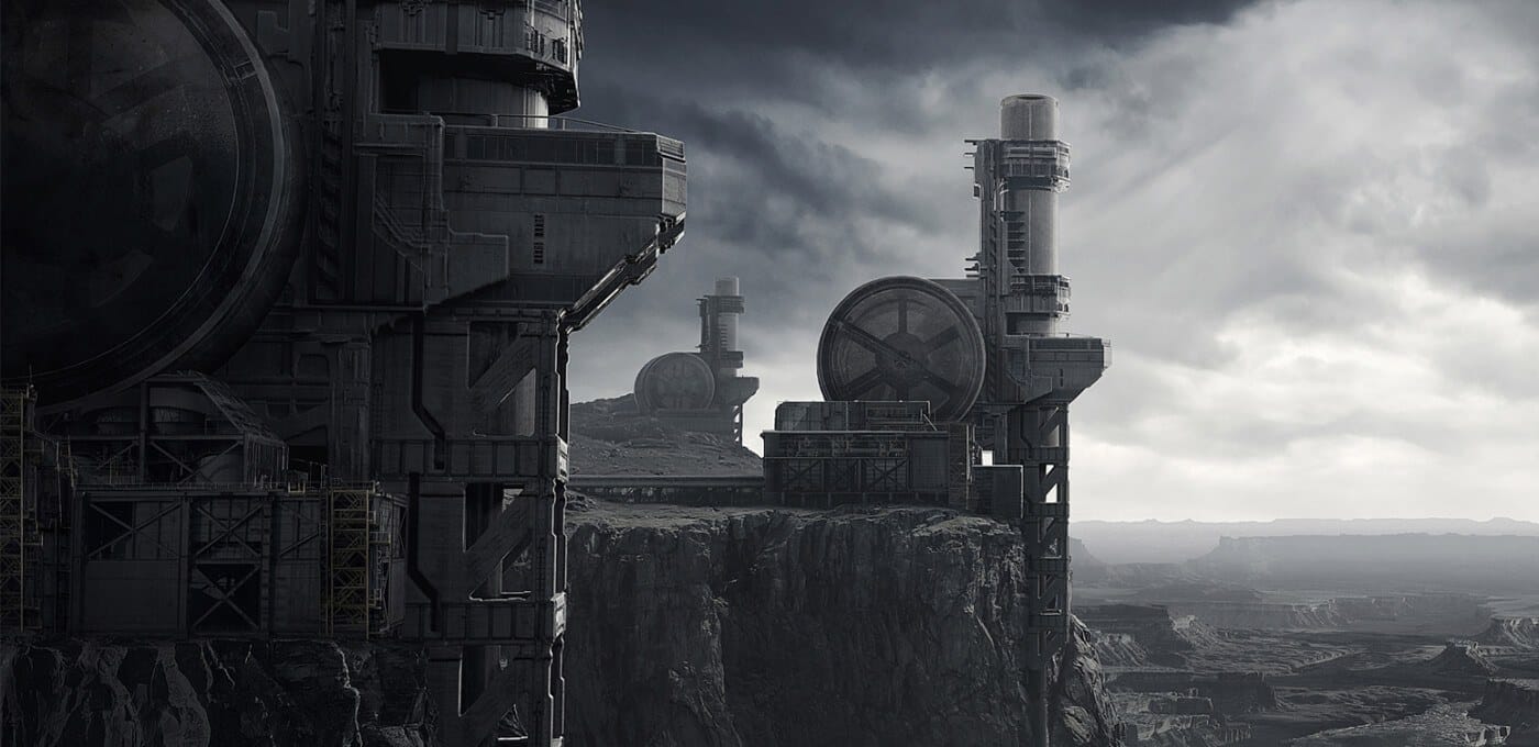 Massive industrial cliffside facility with circular turbine-like disks and steel frameworks, overlooking a desolate canyon under cloudy skies.