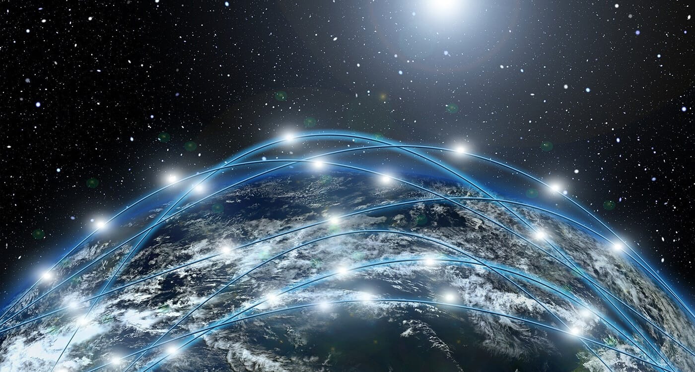 Earth viewed from space with glowing blue network lines and bright hubs spanning the globe, set against a starry, dark cosmos.